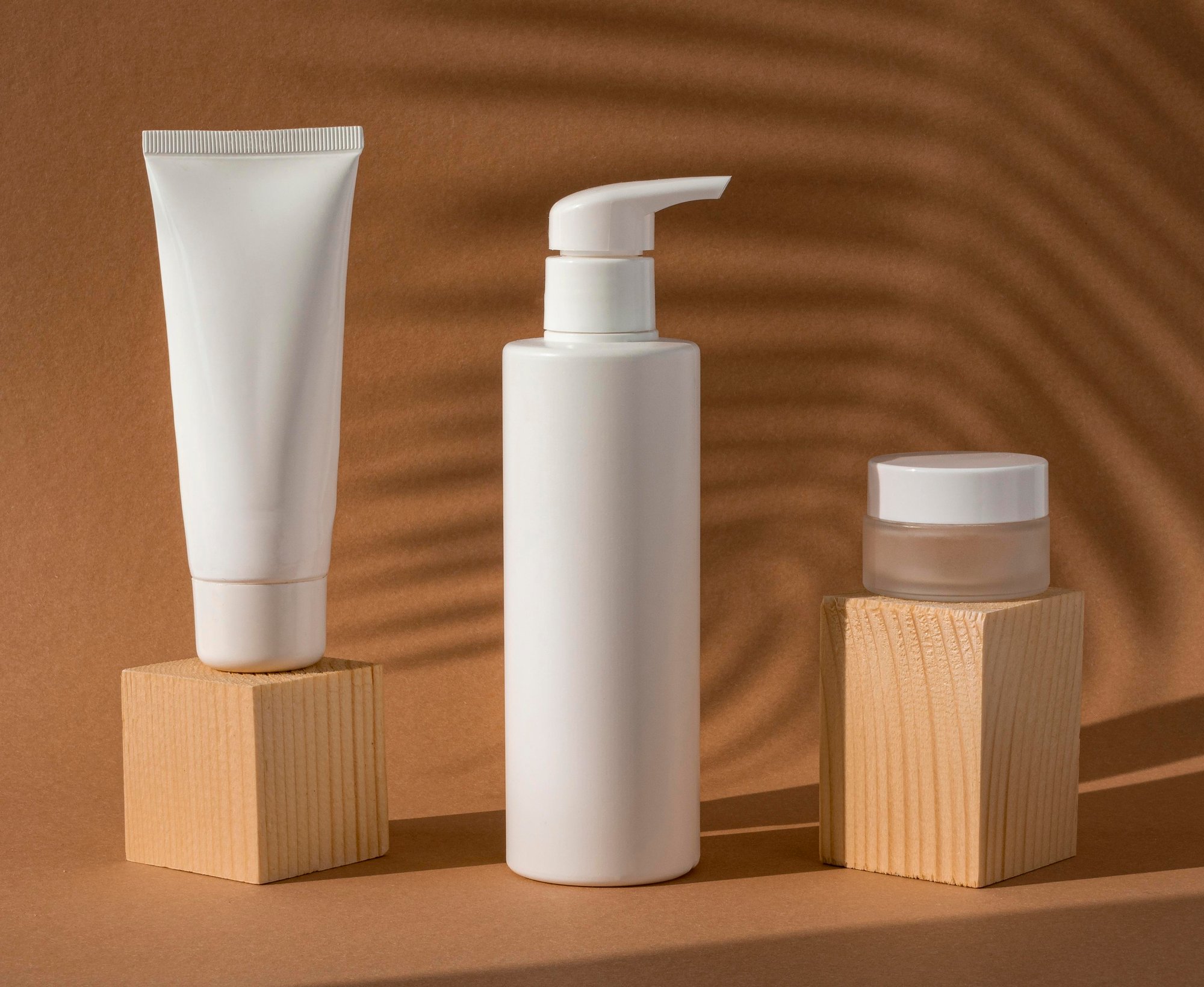 skin-products-arrangement-wooden-blocks